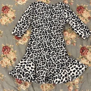 Leopard fitted knee length dress.